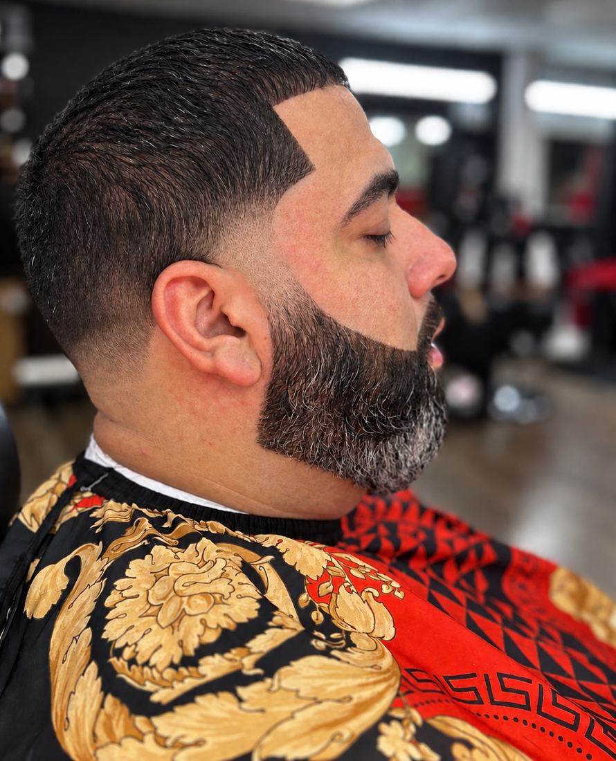 Low fade with beard trim and lineup at Finesse It Pro, a barbershop near Riverview