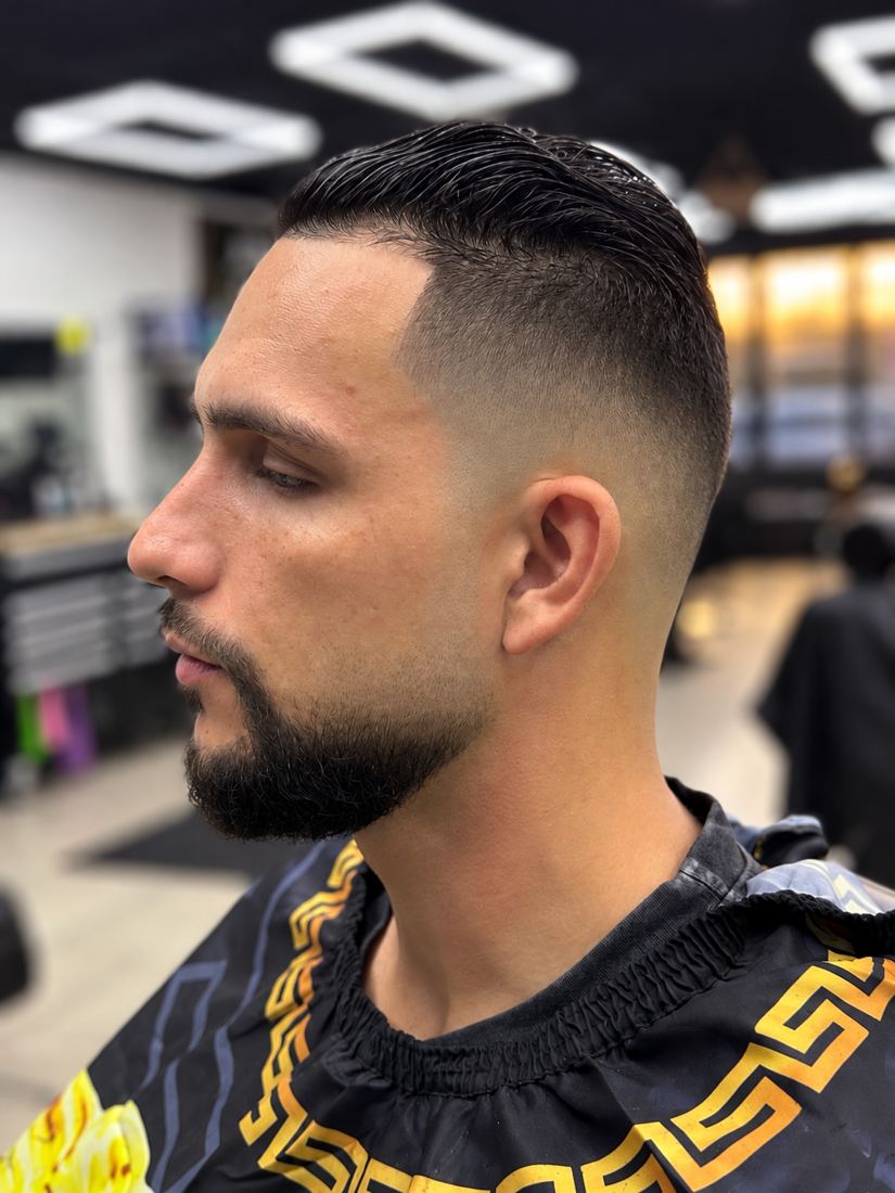 High fade slick back with beard at Finesse It Pro, a barbershop near Mango