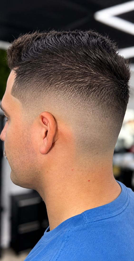 Low fade with a textured crop at Finesse It Pro, a barbershop near Riverview